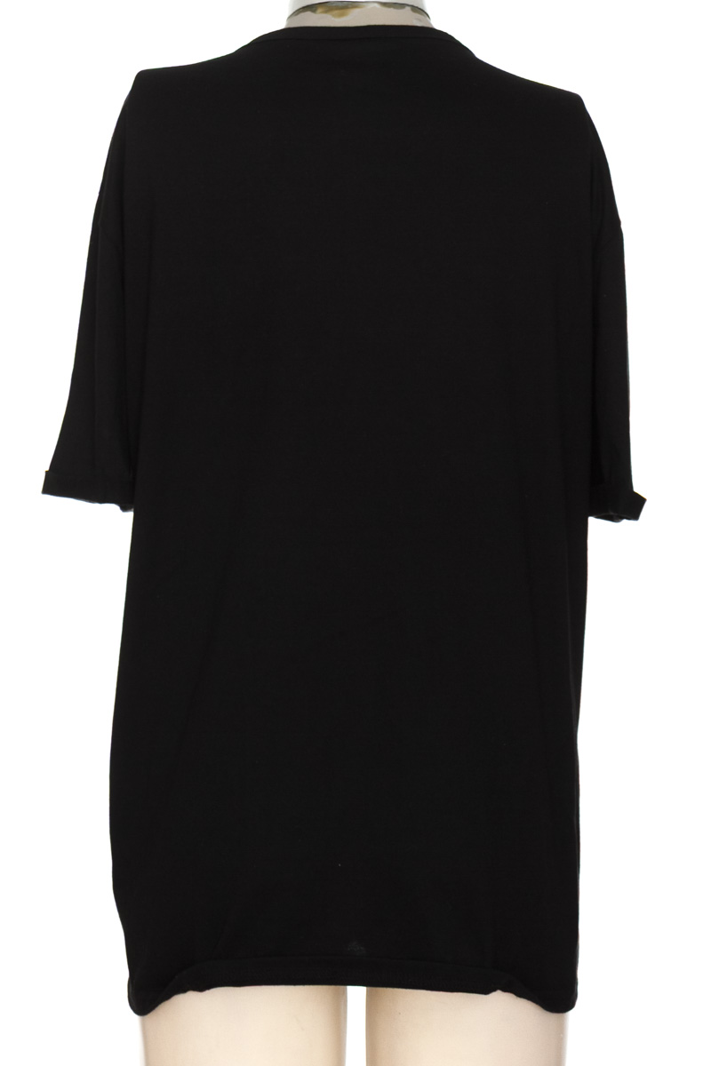 Top / Camiseta color Negro - Real Human