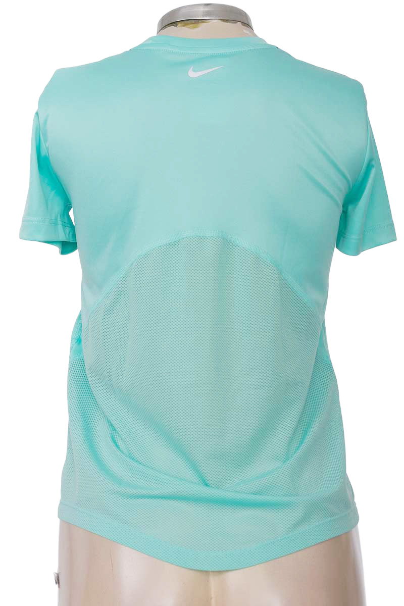 Ropa Deportiva / Salida de Baño color Aguamarina - Nike