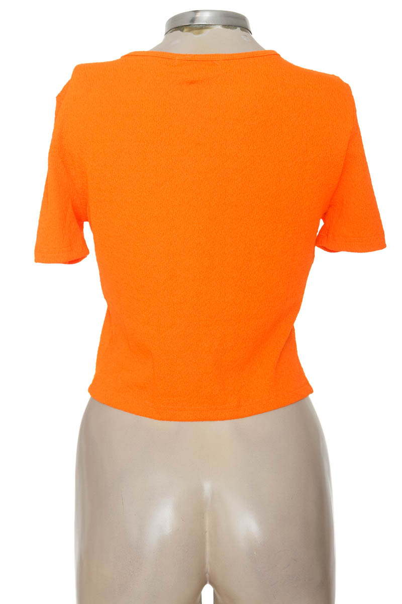 Top / Camiseta color Naranja - Believe